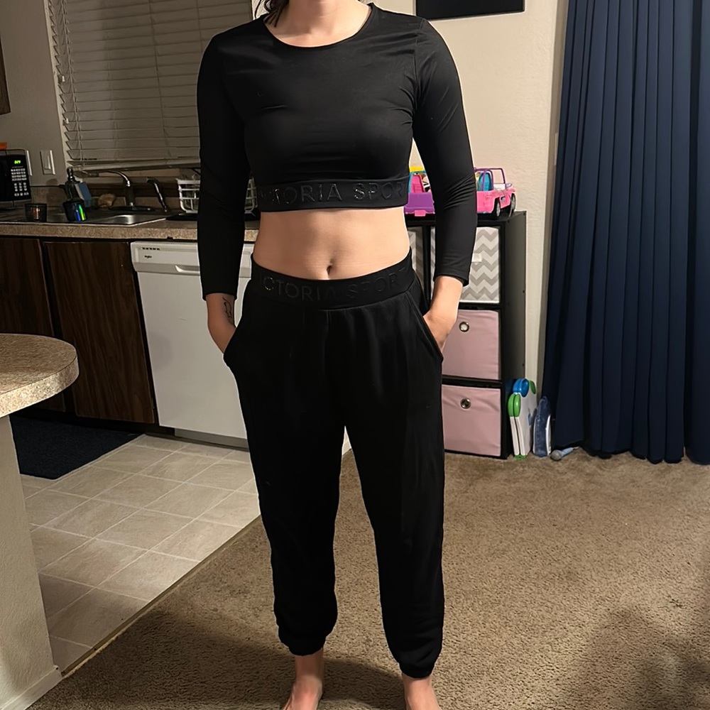 Black sweatpant outfit with matching crop top. Victoria secret brand.